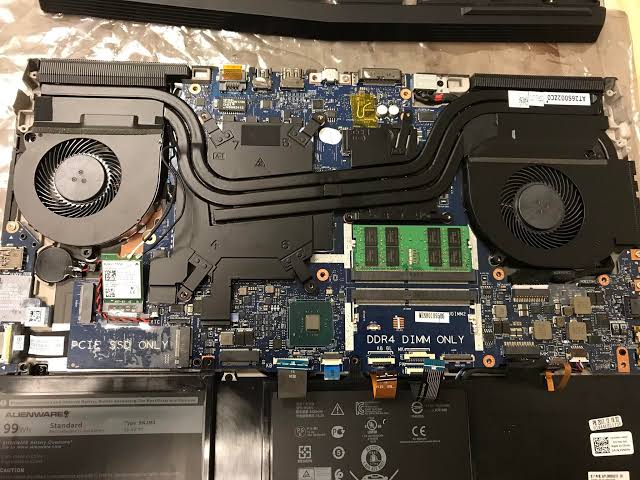 Picture inside a dell alienware laptop with more heatpies