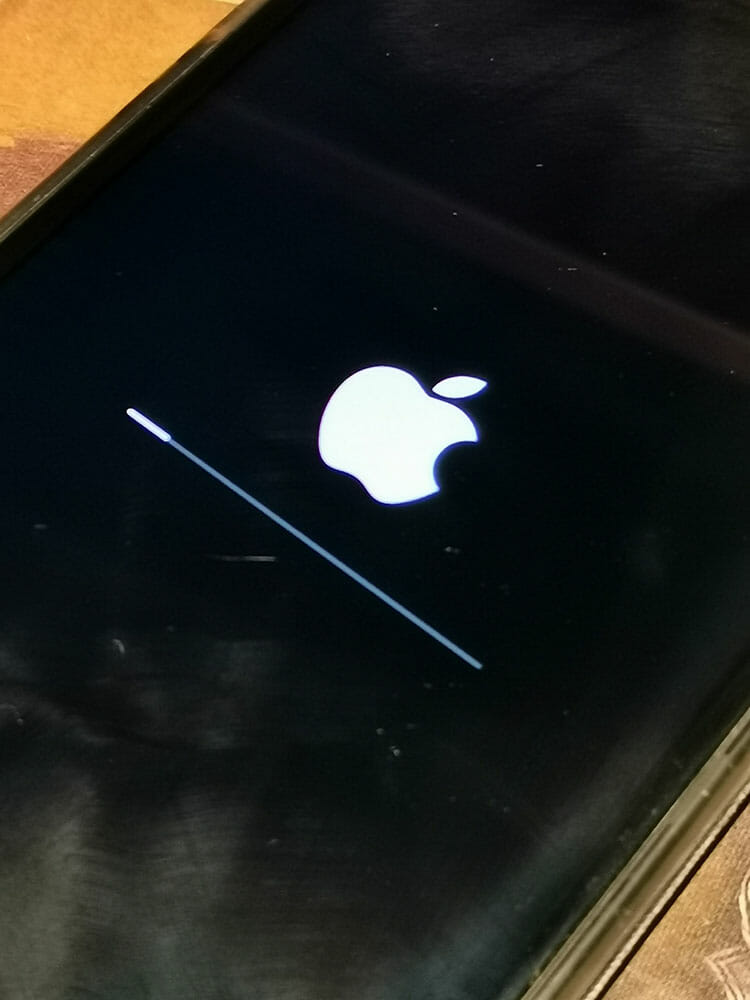 Screenshot of iPhone installing firmware 