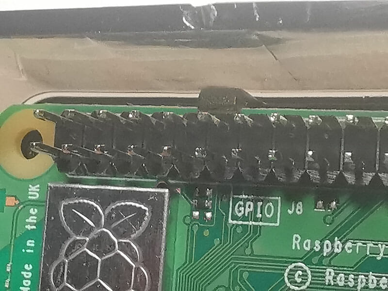 Photo showing the case clip near the GPIO pins.