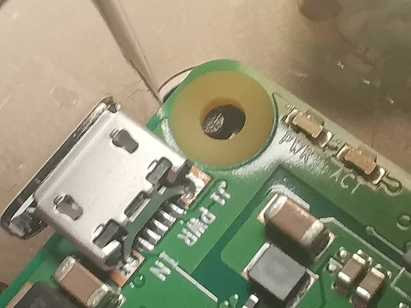 Photo of the Raspberry PI off center of the lugs